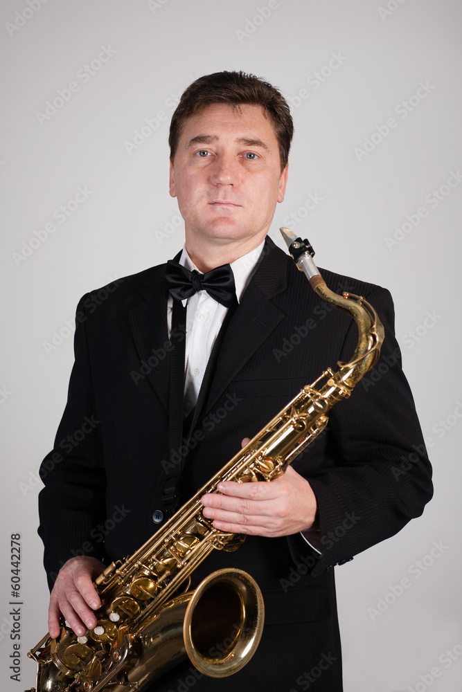 Fototapeta premium Saxophonist with a saxophone
