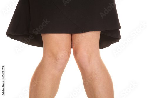 Woman knees black skirt