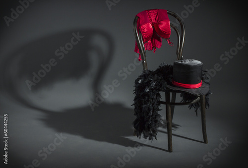 Fotobehang On retro chair is a cabaret dancer clothing.