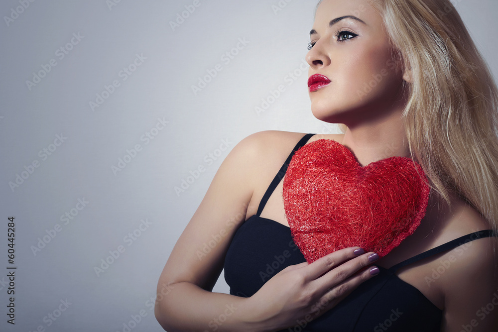 Lovely Beautiful Blond Woman with Red Heart.Symbol of Valentine Lovely Beautiful Blond Woman with Red Heart.Symbol of Valentine