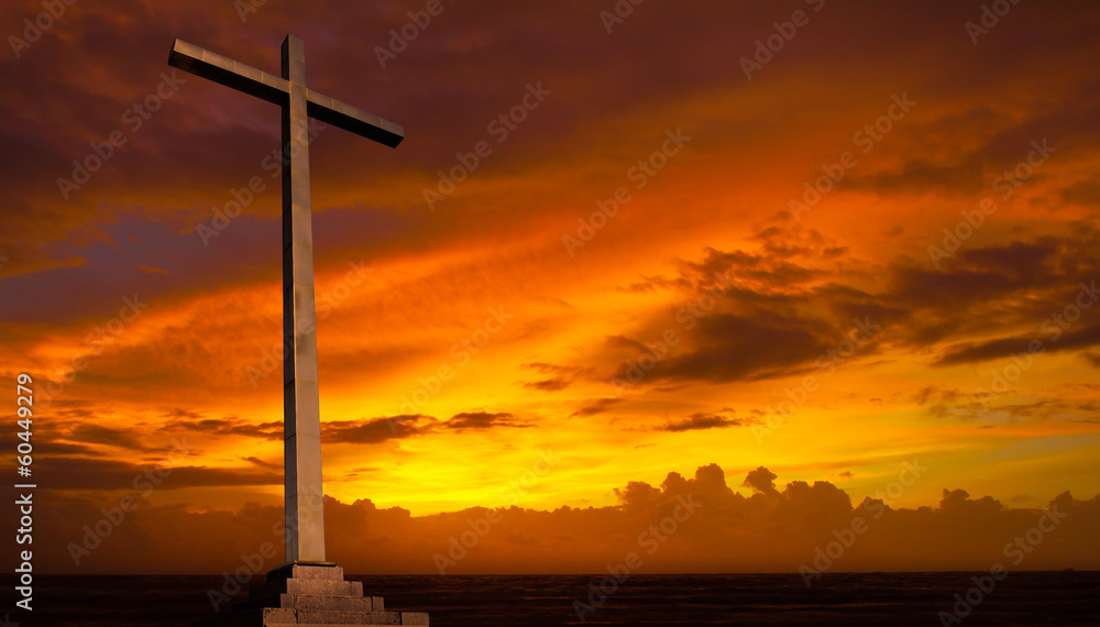 Obraz premium Christian cross on sunset sky. Religion background.