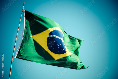 Fotografie The national flag of Brazil (Brasil) flutters in the wind
