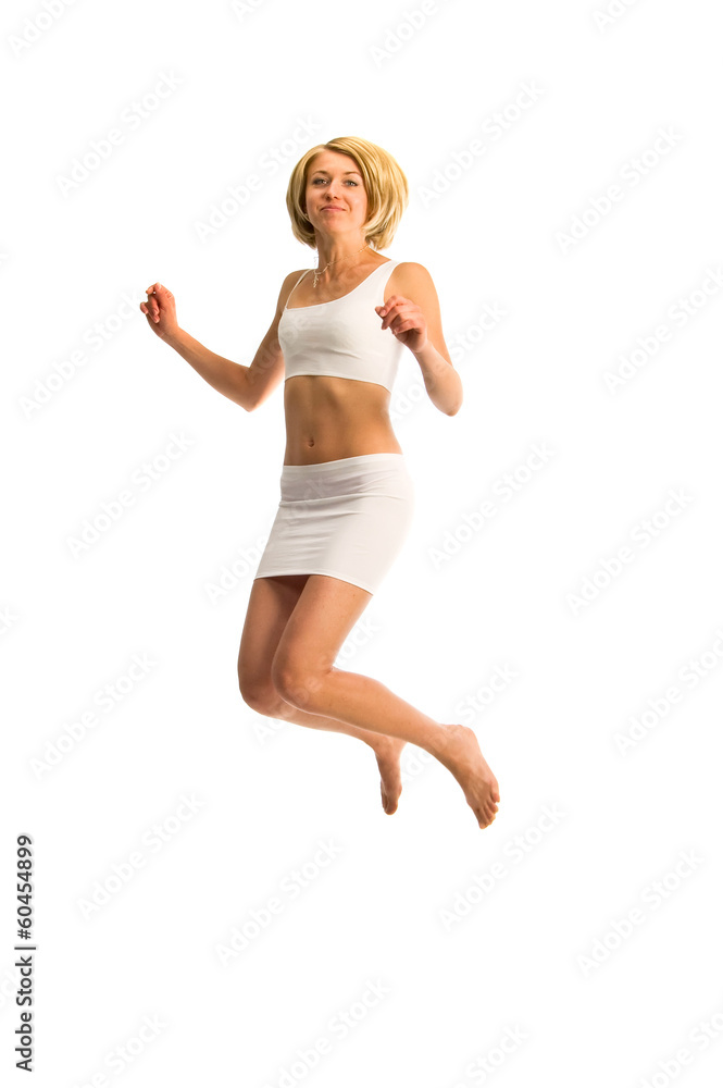 Casual woman jumping in joy, isolated over a white background Casual woman jumping in joy, isolated over a white background