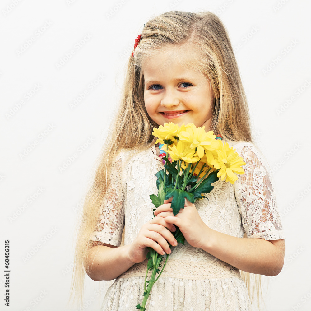 Smiling Girl hold yellow flowers. Smiling Girl hold yellow flowers.