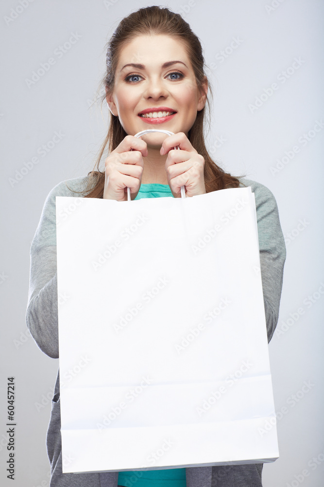 Casual style woman hold shopping bag. Studio female isolated po