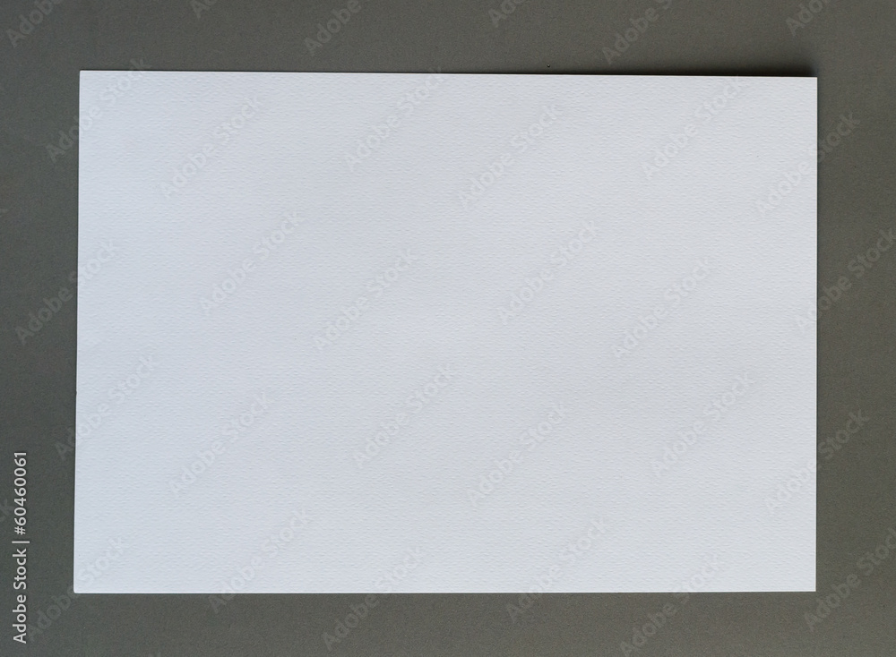 White crumpled paper on gray background horizonta
