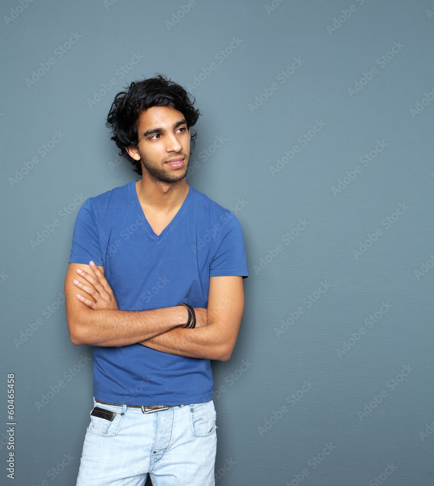 Portrait of a casual man standing with arms crossed Portrait of a casual man standing with arms crossed