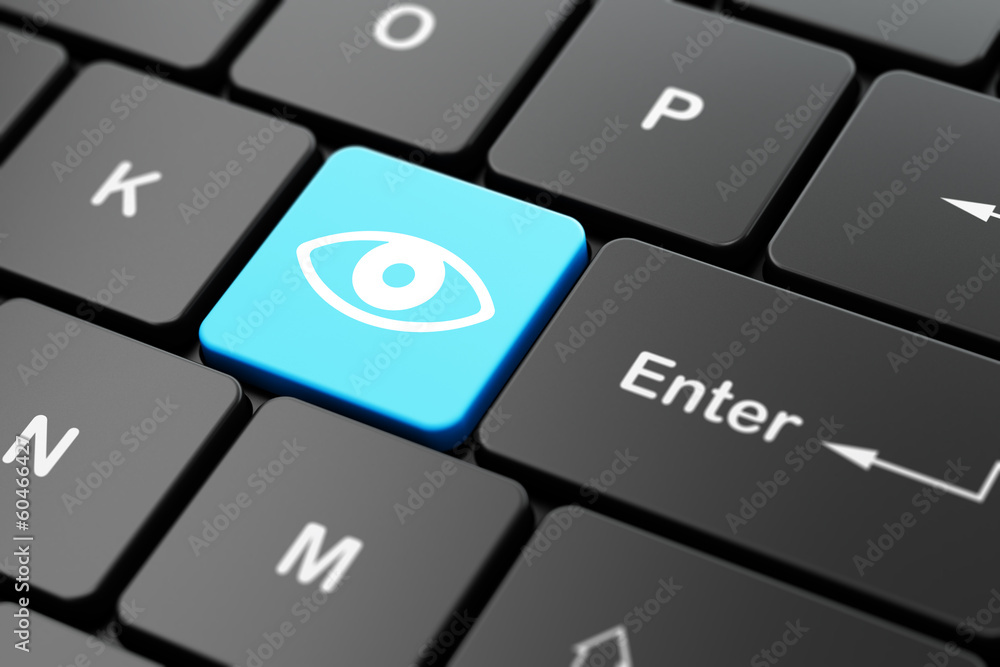 Protection concept: Eye on computer keyboard background Protection concept: Eye on computer keyboard background