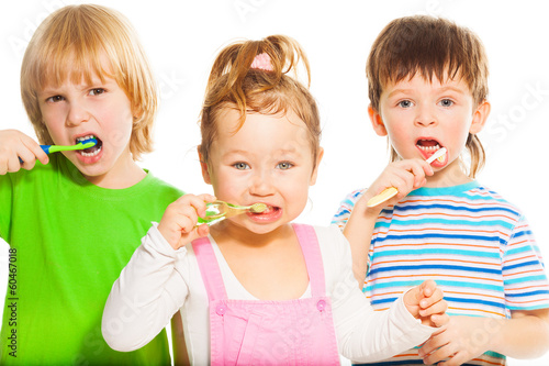 Three little brushing their teeth #60467018