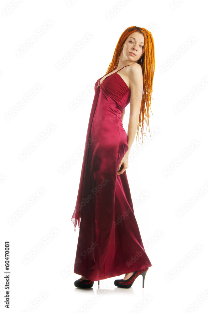 A beautiful red haired woman in red dress A beautiful red haired woman in red dress