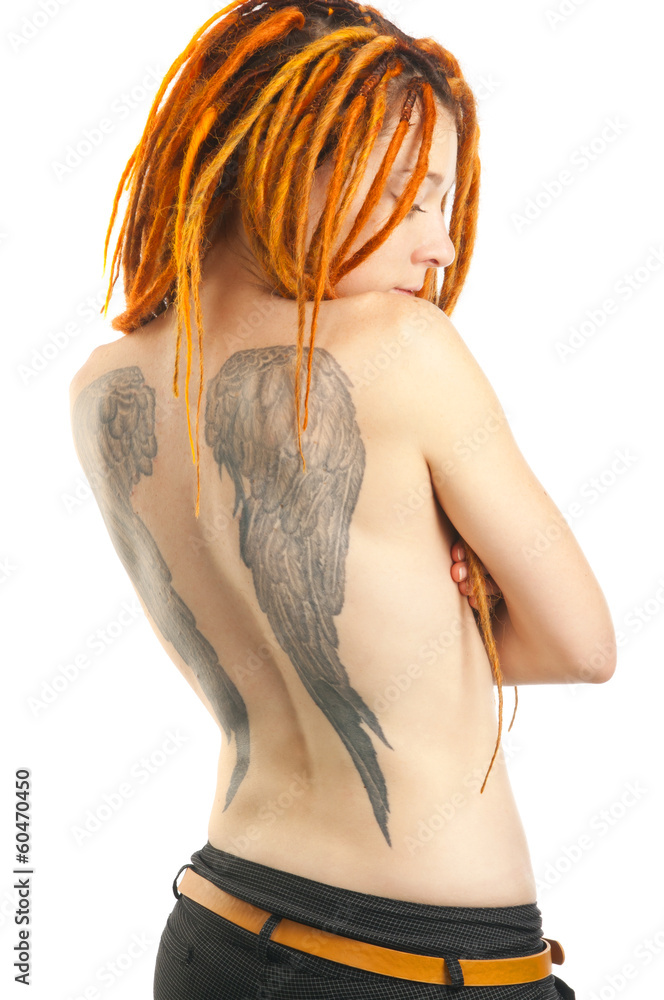 Naklejka premium Portrait of young beautiful woman with tattoo