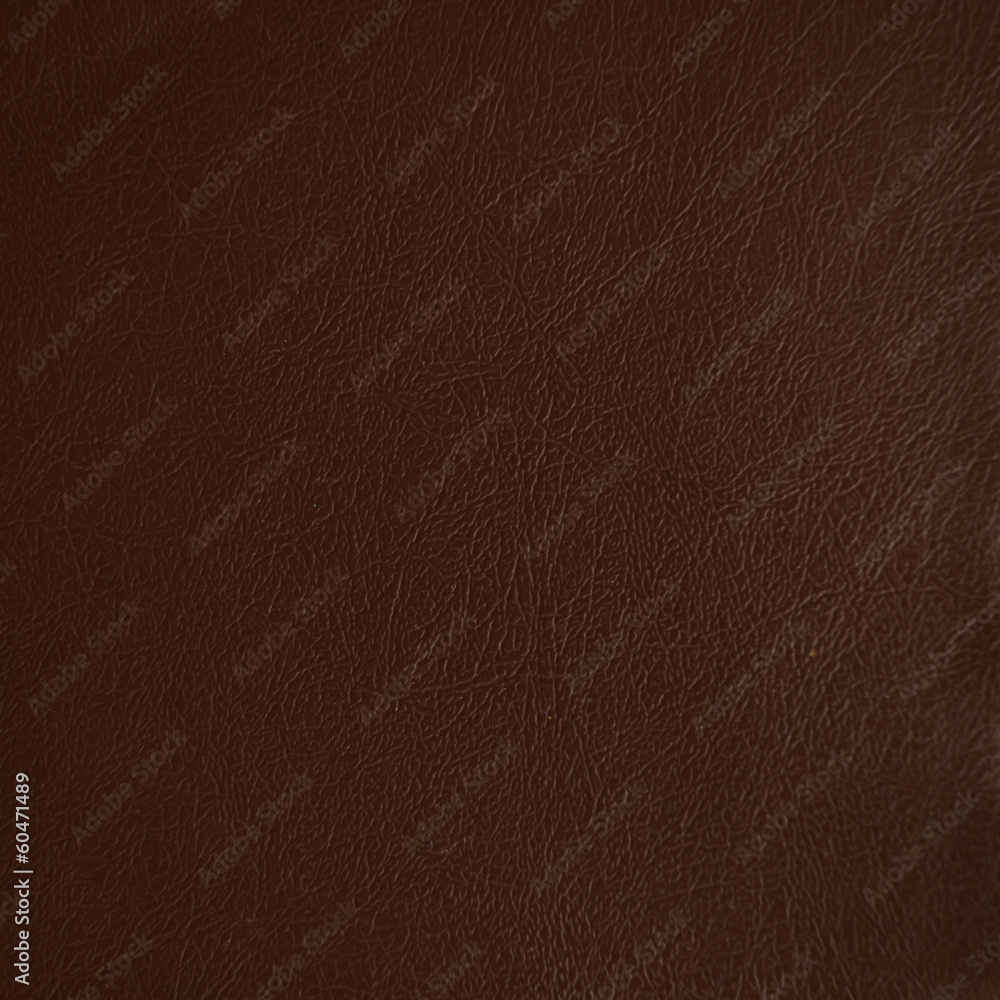 Fototapeta premium Brown leather texture closeup background.