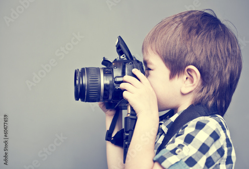 Baby boy with camera