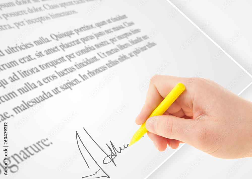Hand writing personal signature on a paper form Hand writing personal signature on a paper form