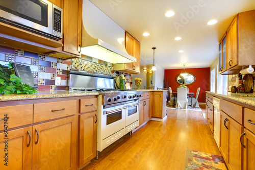 Furnished bright light brown kitchen room