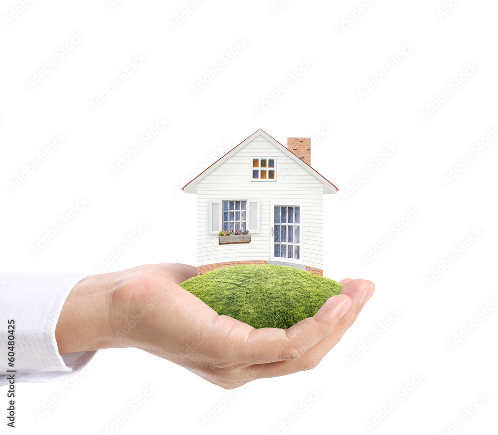 holding house representing home ownership holding house representing home ownership
