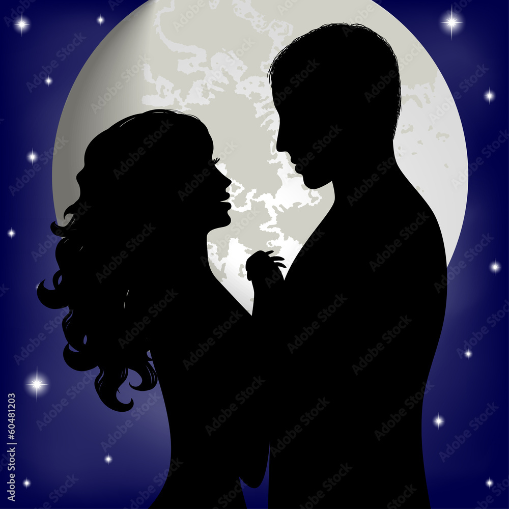 Couple in love on the background of the moon