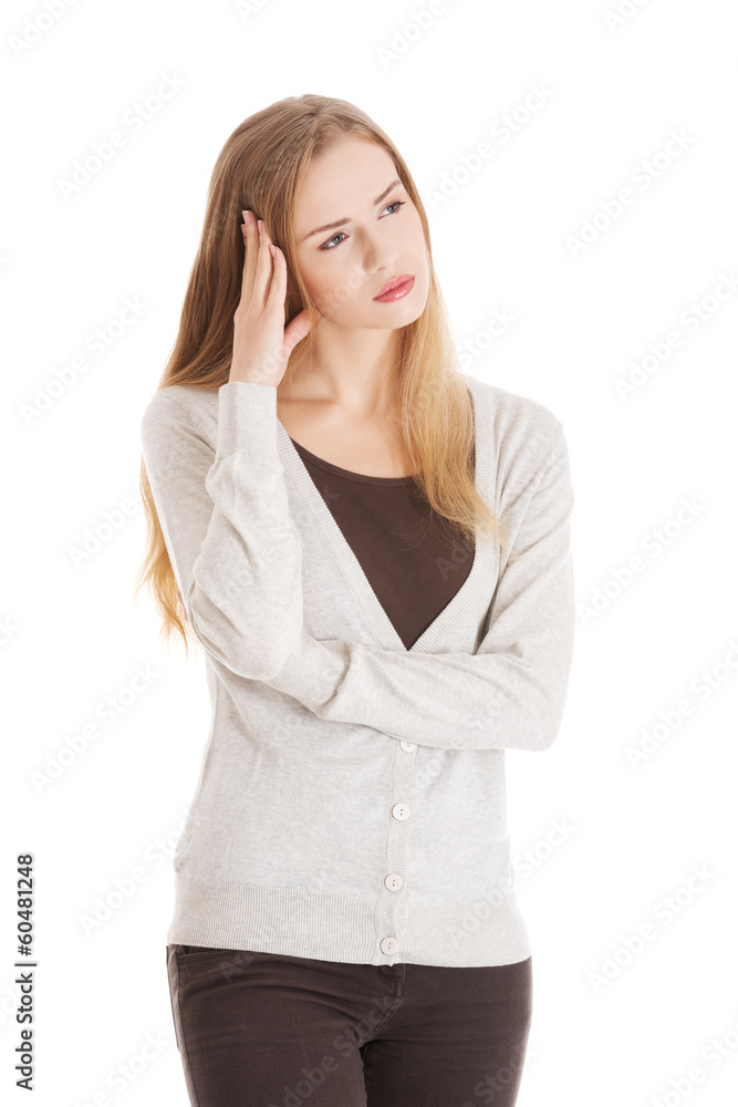 Beautiful casual woman looks worried. Beautiful casual woman looks worried.