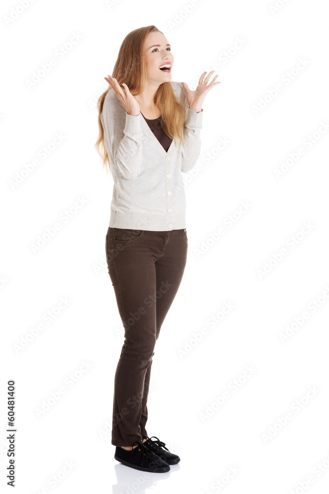Beautiful positive and casual woman expressing surprise. Beautiful positive and casual woman expressing surprise.