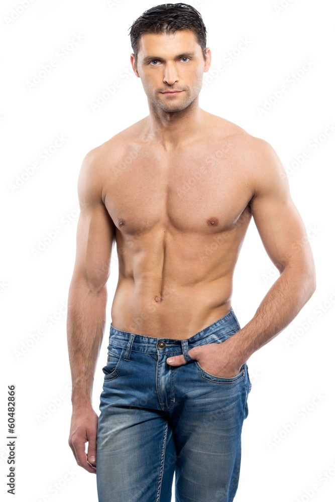 Handsome young man in blue jeans with naked torso Handsome young man in blue jeans with naked torso