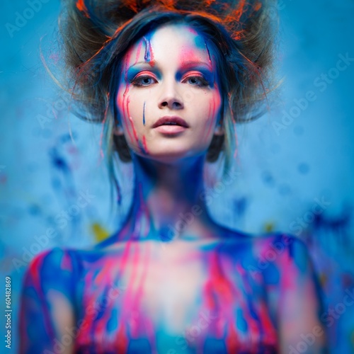 Bild auf Leinwand Young woman muse with creative body art and hairdo