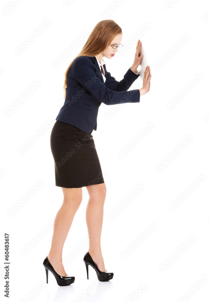 Beautiful business woman pushing copy space. Beautiful business woman pushing copy space.