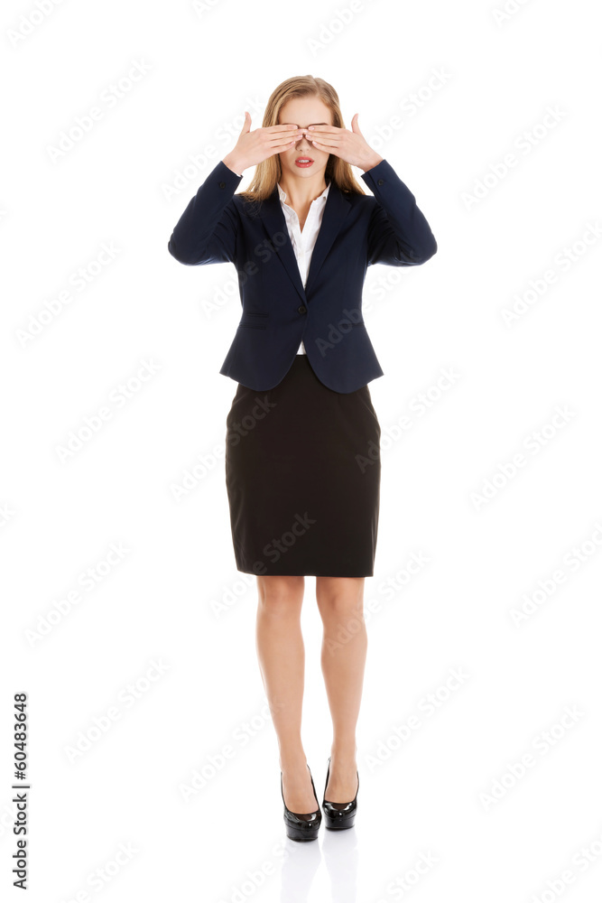 Beautiful business woman covering her eyes. Beautiful business woman covering her eyes.
