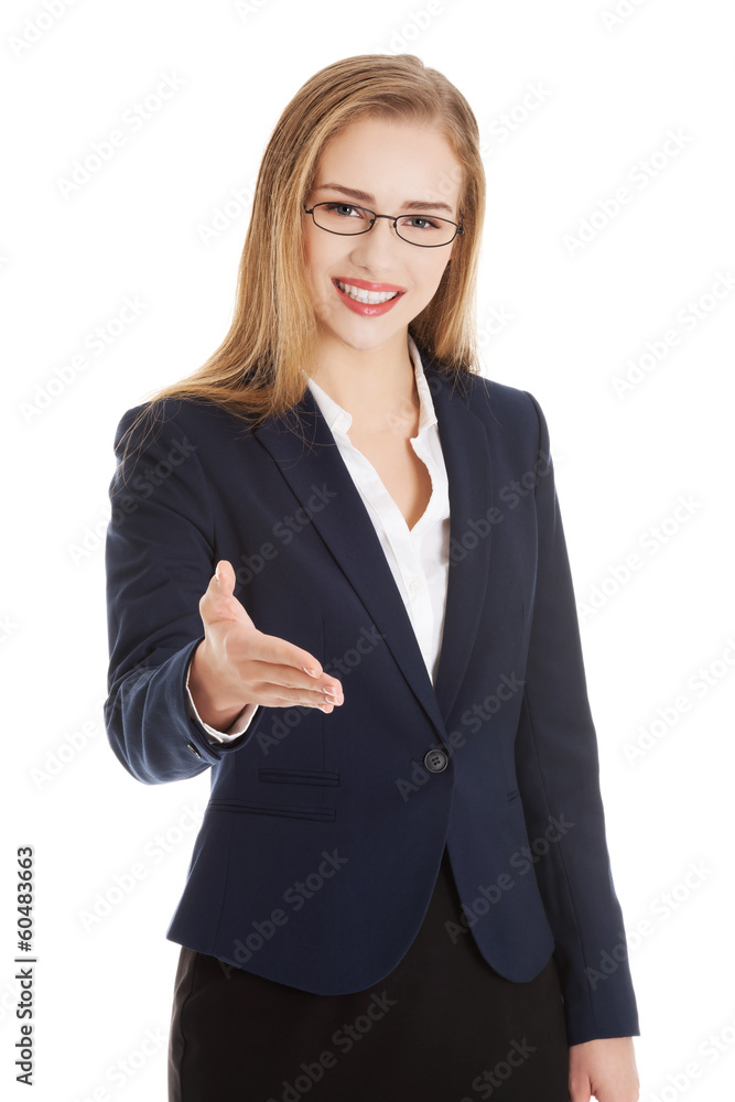 Beautiful caucasian business woman giving a hand. Beautiful caucasian business woman giving a hand.