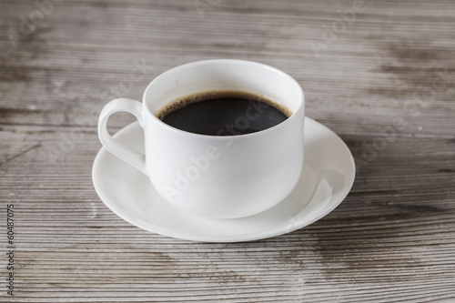 Coffee cup center on wooden table