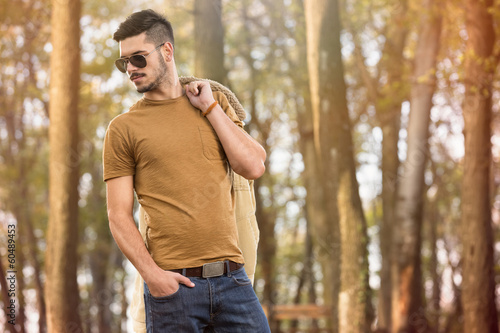 Fotografie Trendy man in autumn park