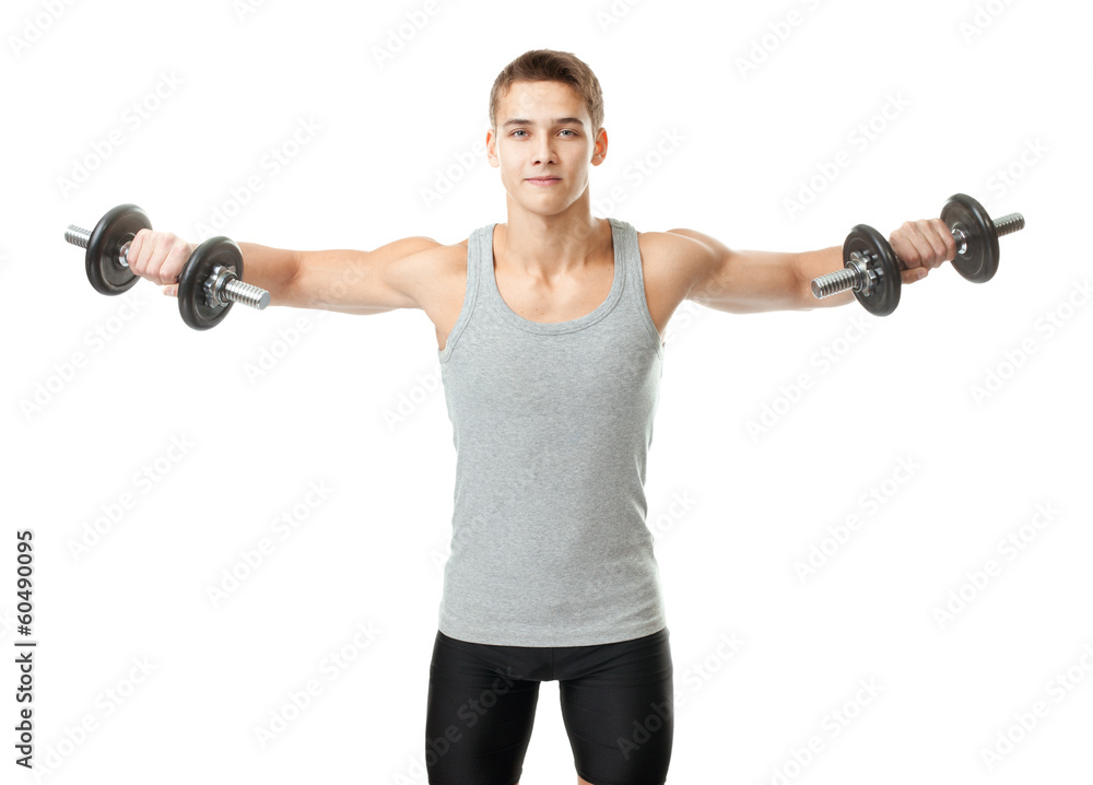 Fit man exercising with dumbbells Fit man exercising with dumbbells