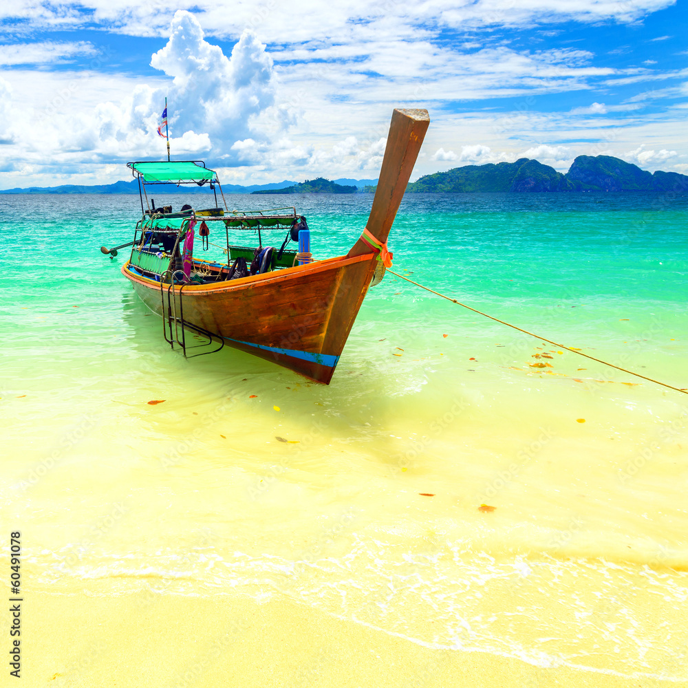 Long tailed boat at Kradan island, Thailand Long tailed boat at Kradan island, Thailand