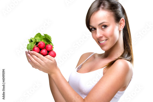 Eat healthily - Beautiful woman holding a bunch of radishes © Zsolnai Gergely