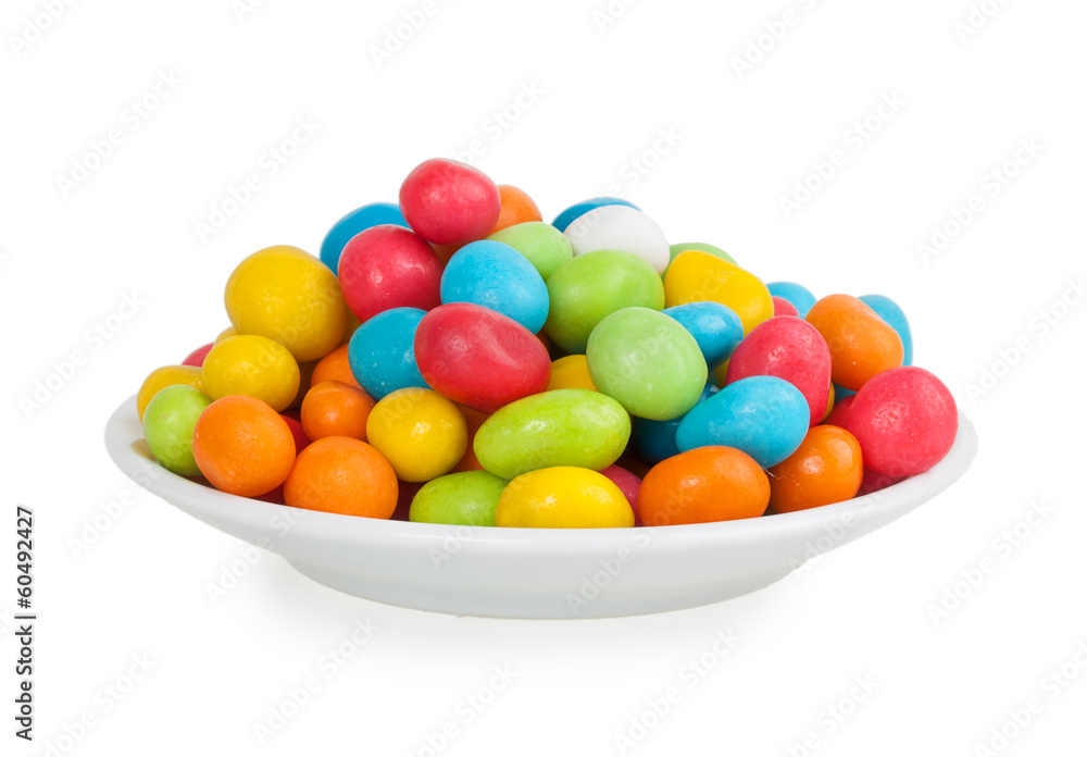colored candies in white saucer colored candies in white saucer