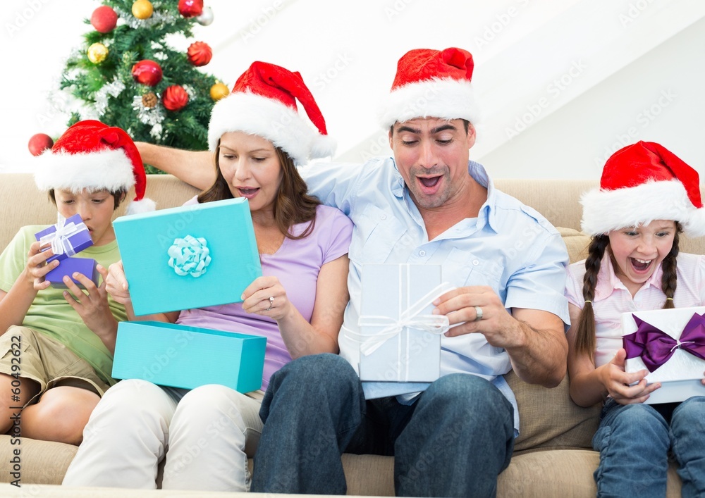 Family opening Christmas presents Family opening Christmas presents