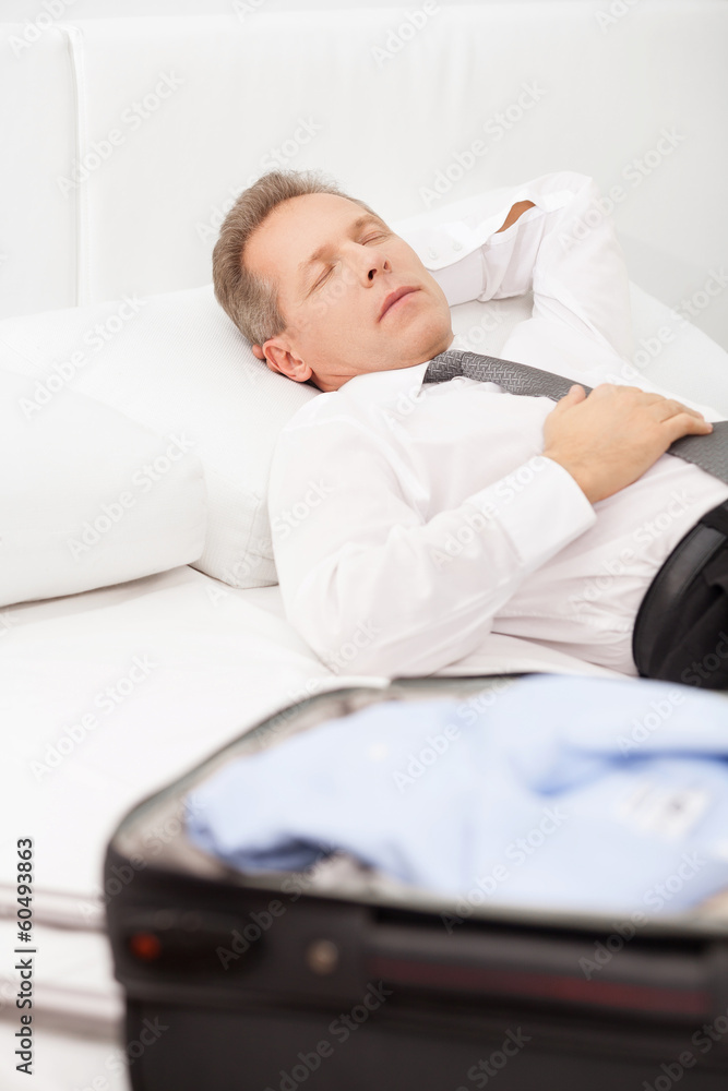 Tired businessman sleeping. Tired businessman sleeping.