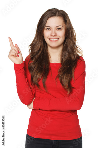 Woman showing pointing and smiling.