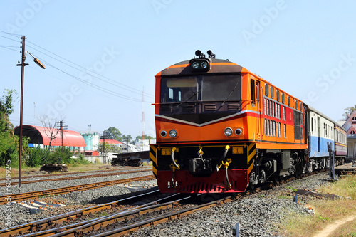 Red orange diesel engine locomotive