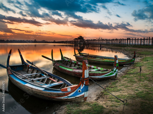 Fotobehang .Colorful old boats on a lake in Myanmar