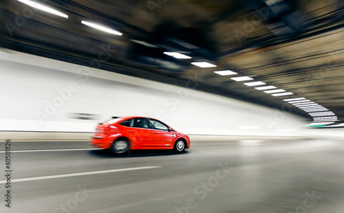 Interior of an urban tunnel with car motion blur