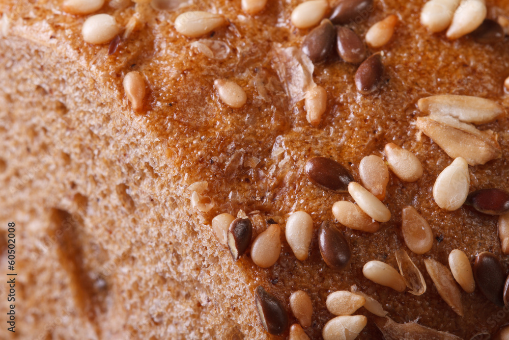 Sliced bread with sunflower seeds and nuts closeup. macro Sliced bread with sunflower seeds and nuts closeup. macro