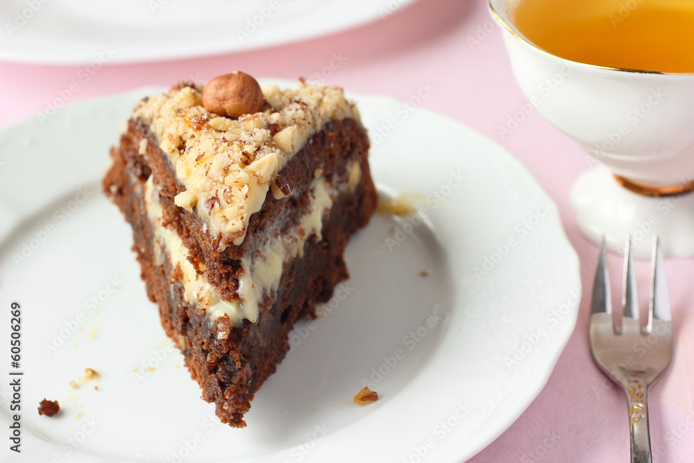Chocolate cake with buttercream and nuts Chocolate cake with buttercream and nuts