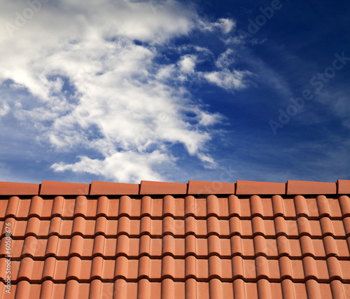 Roof tiles and sky with clouds
