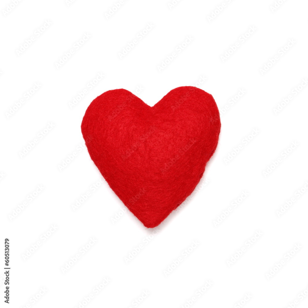 Red felt heart isolated on white