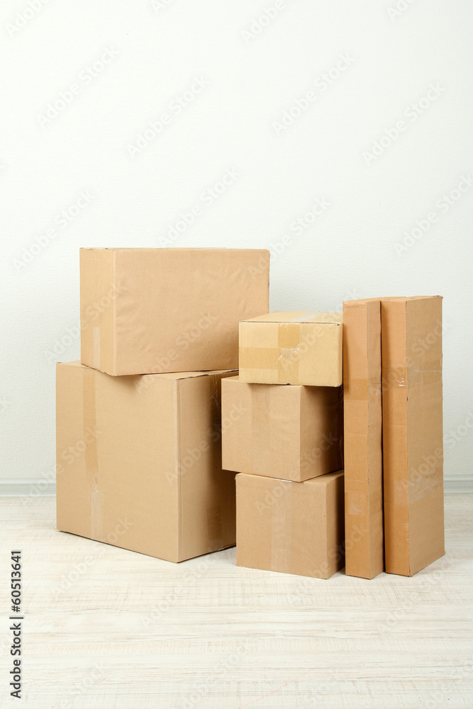 Different cardboard boxes in room Different cardboard boxes in room