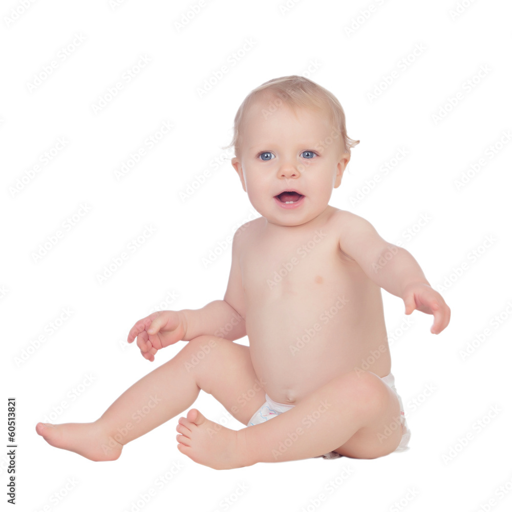 Adorable blonde baby in diaper sitting on the floor Adorable blonde baby in diaper sitting on the floor