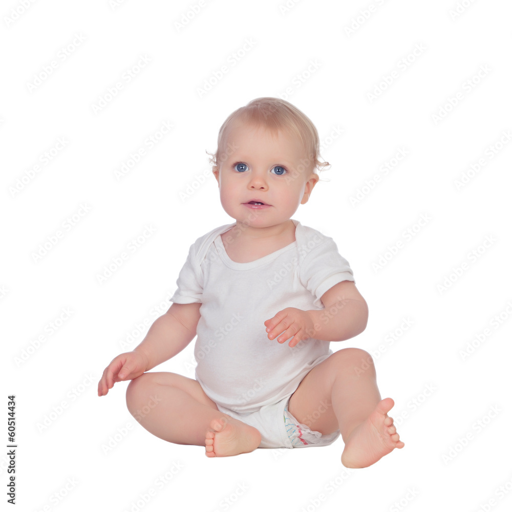 Adorable blonde baby sitting on the floor Adorable blonde baby sitting on the floor