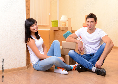 Young couple moves into new...