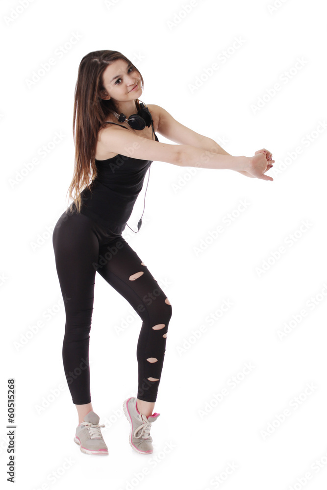 Sporty teenager dancing with headphones Sporty teenager dancing with headphones