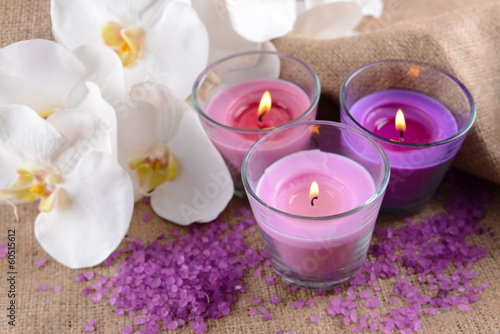 Composition with beautiful colorful candles  sea salt and